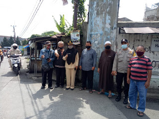 Bhabinkamtibmas Desa Kota Batu Sambangi Sekaligus Monitoring Pembetulan Saluran Air